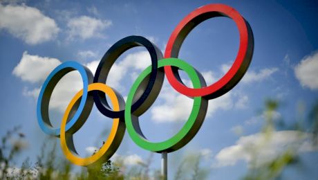 Ce simbolizează cele cinci cercuri Olimpice și cum au fost alese?