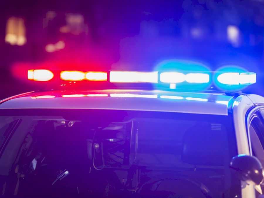 Flashing lights on top of police patrol car