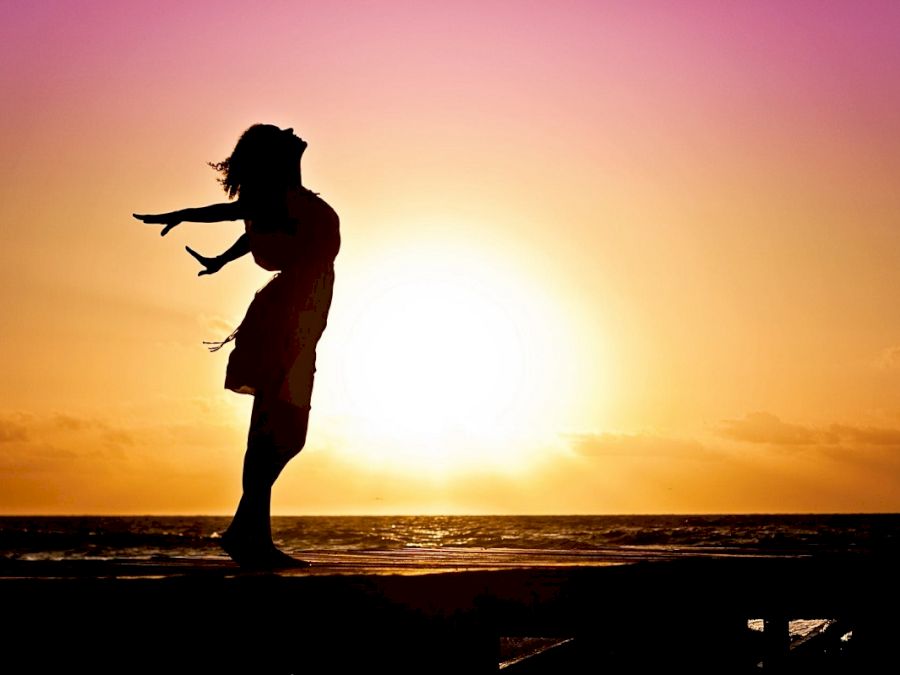 woman-happiness-sunrise-silhouette-40192