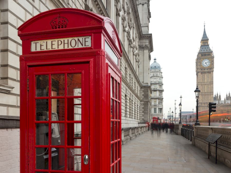 A view of Big Ben and a classic red phone box in London, United Kingdom