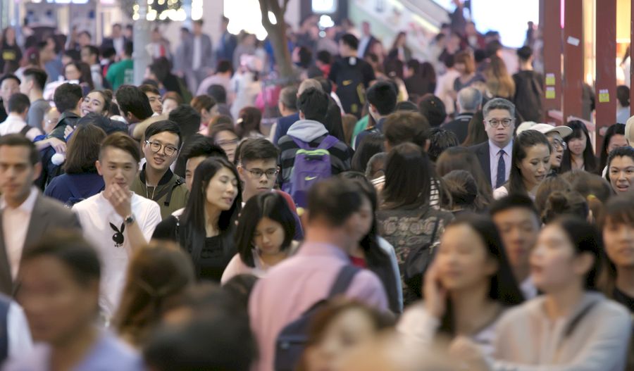 Causeway Bay, Hong Kong, 17 March 2018:- Crowded of people crossing the street at night in Hong Kong