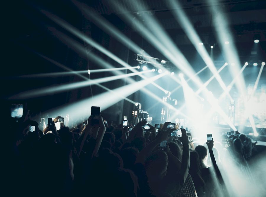 MINSK, BELARUS - 20 SEPTEMBER, 2018: Crowd at concert - retro style photo